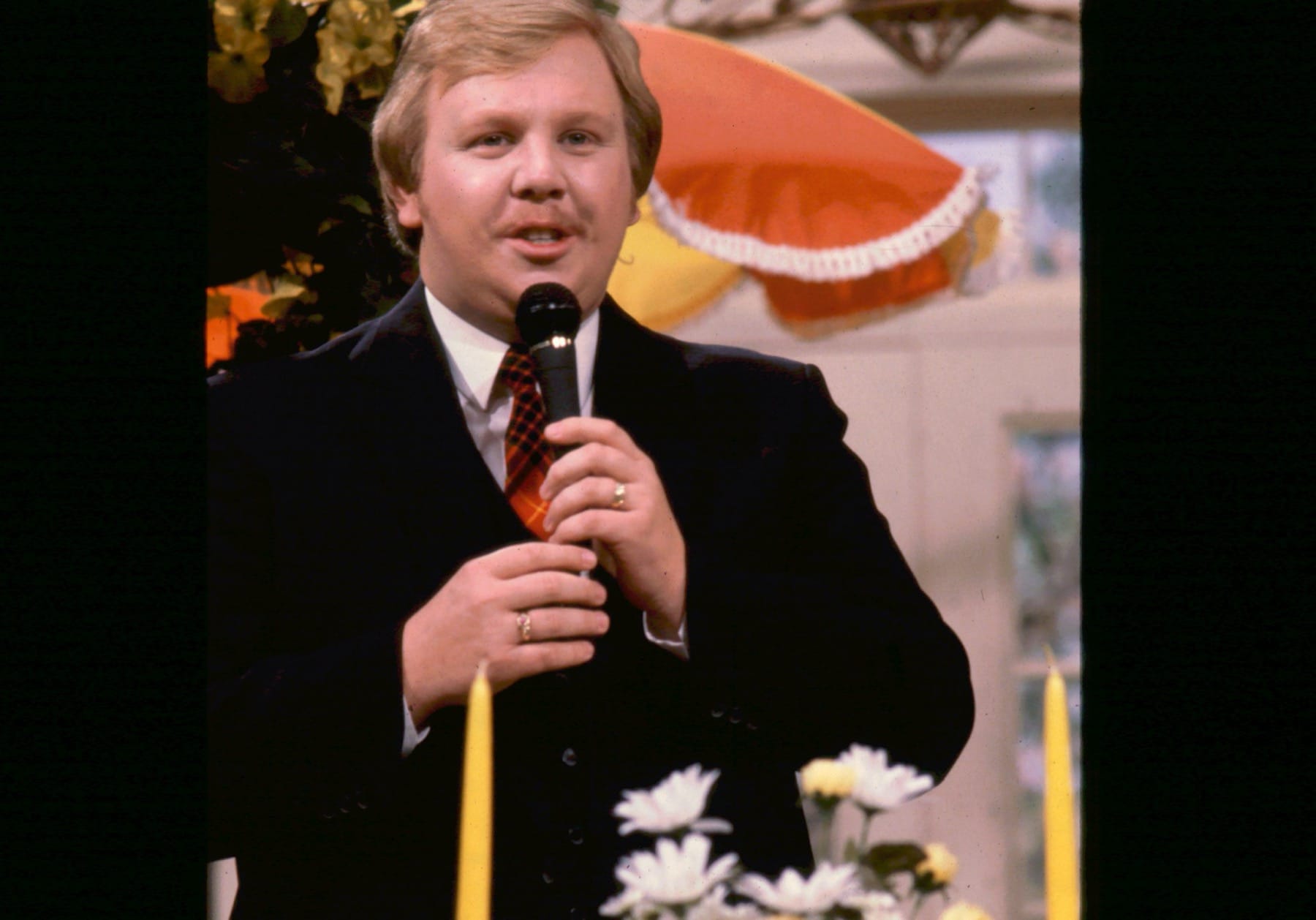 A young Philip Cameron singing on Christian television